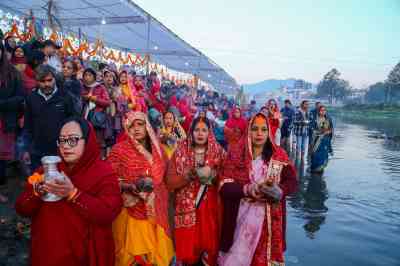 Nepali Hindu women take dip in the Bagmati River during the festival of Chhath and pray for, among other things, the long life of their husbands
