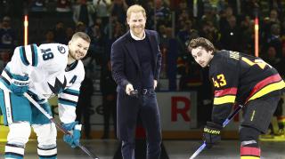 The Duke of Sussex with the captains of the Vancouver Canucks and the San Jose Sharks before their game in Vancouver on Monday night