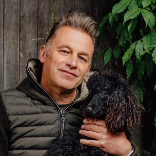 Chris Packham with one of his pet poodles