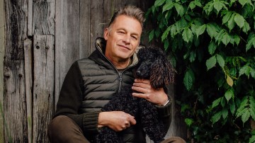 Chris Packham with one of his pet poodles