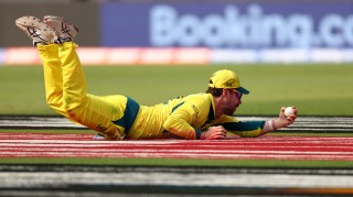 Head holds the catch to remove Sharma having had to watch the flight of the ball over his shoulder